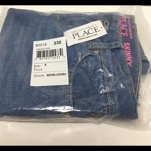 the Children’s Place blue washed girls jeans size 8  new with tags.